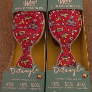 Two mini pink wet brushes